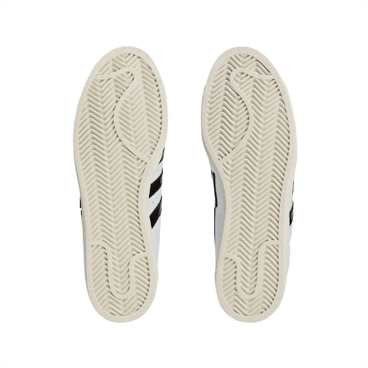 White rubber outsoles with herringbone tread and black sidewall trim