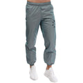 Light blue track pants with elastic waistband, cuffed legs, and small side logo