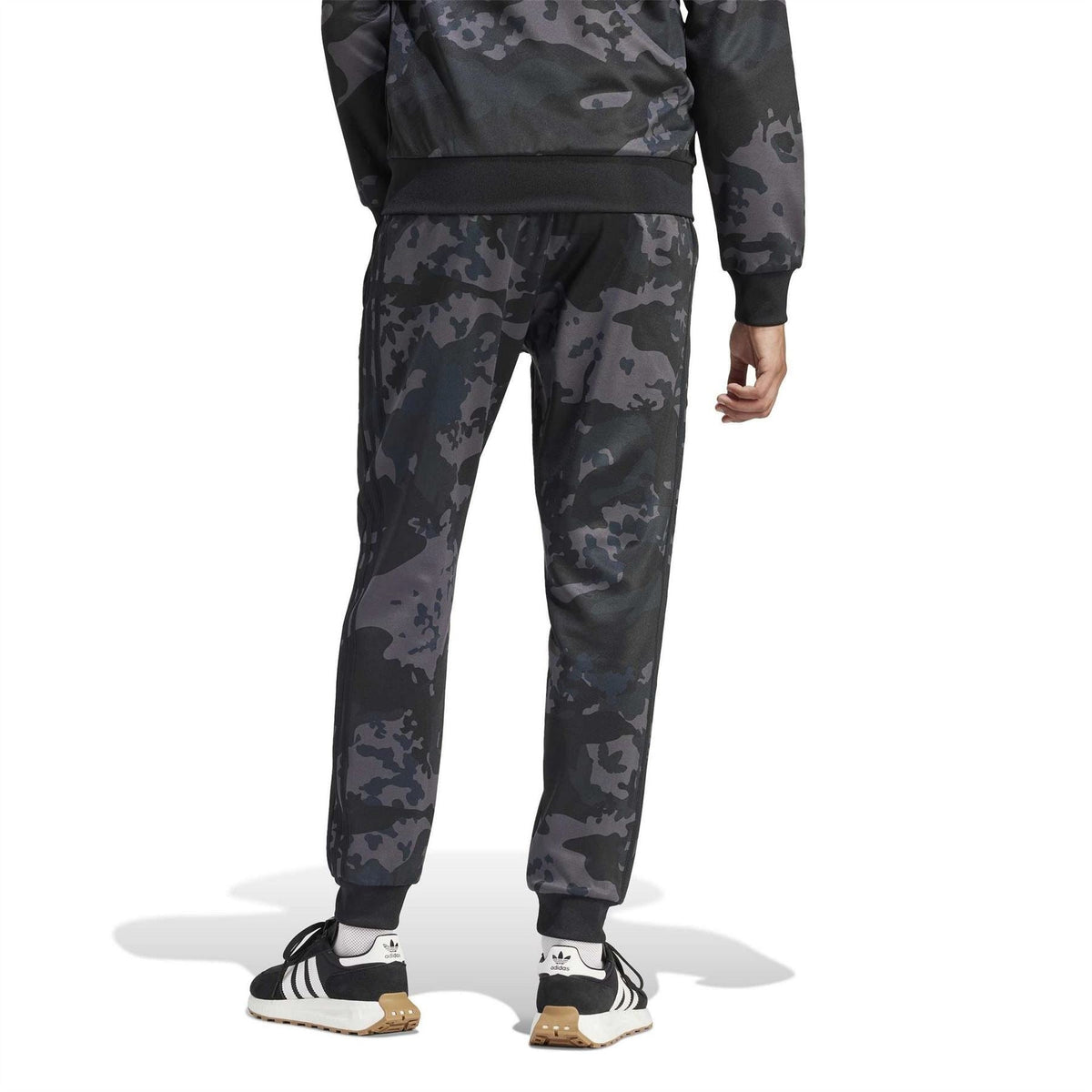 adidas Originals camo track pants with tapered slim fit and elastic cuffs