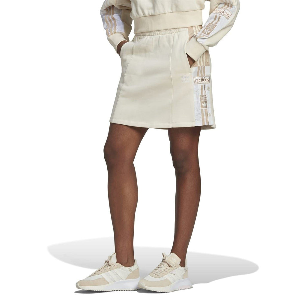 Light mini skirt with elastic waist, striped side panels, and adidas Originals logo