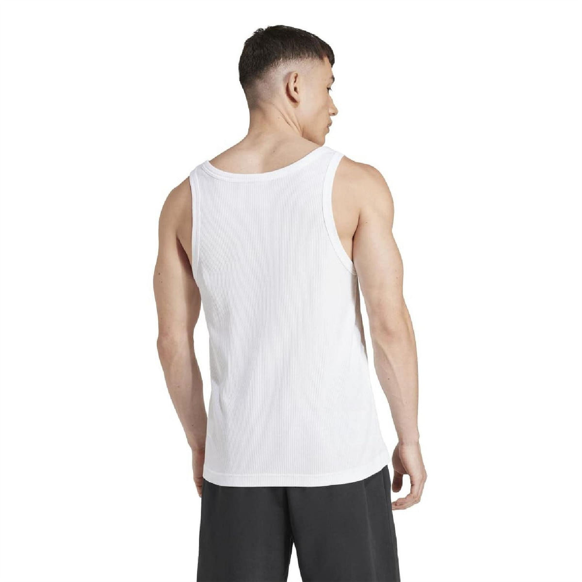 White sleeveless tank top with scoop back, plain back no logo visible