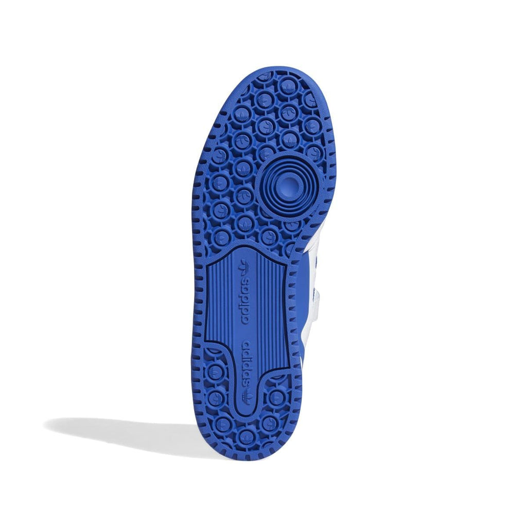 Blue rubber outsole with circular traction pattern and adidas branding