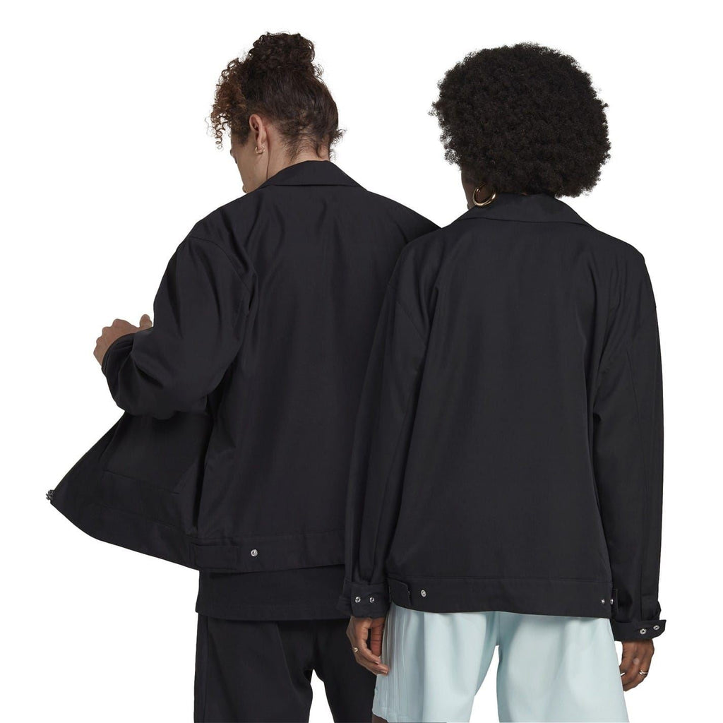 Black zip-up jacket shown from back on two models, with stand collar and sleeves