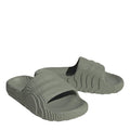 adidas Originals Adilette 22 textured slide sandals in black with a cushioned footbed and textured strap for comfort and style