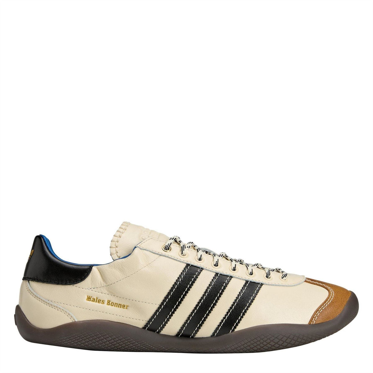 adidas Originals low-top sneakers in cream, black, and brown with lace-up and stripes
