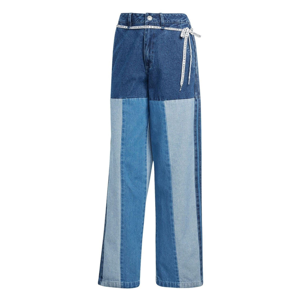 Patchwork straight-leg jeans with blue denim panels, belt loops, and hanging drawstring.