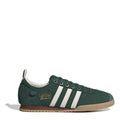 Green suede low-top sneakers with white three-stripe details and lace-up front