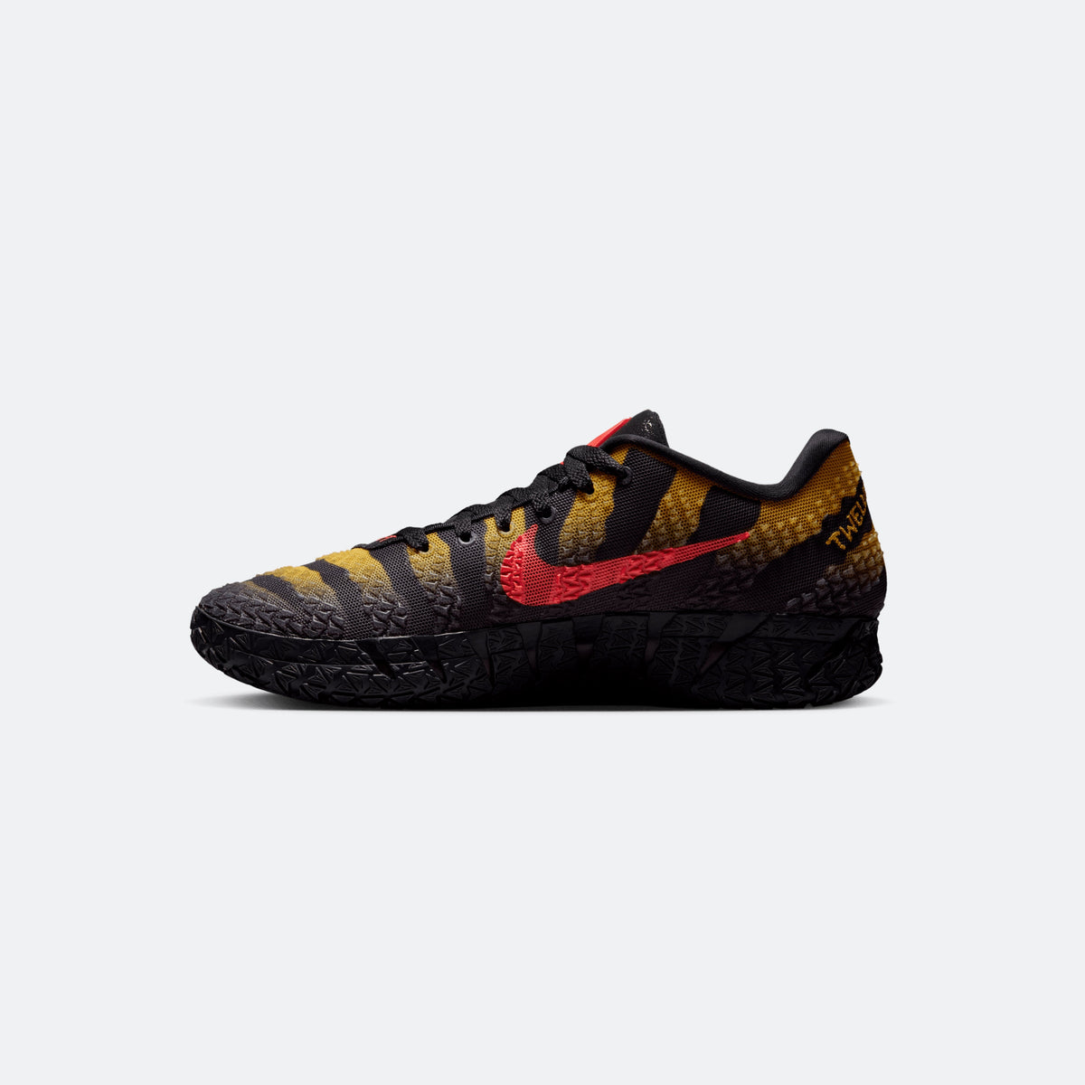 Side view of black basketball sneakers with red forefoot logo and yellow textile accents