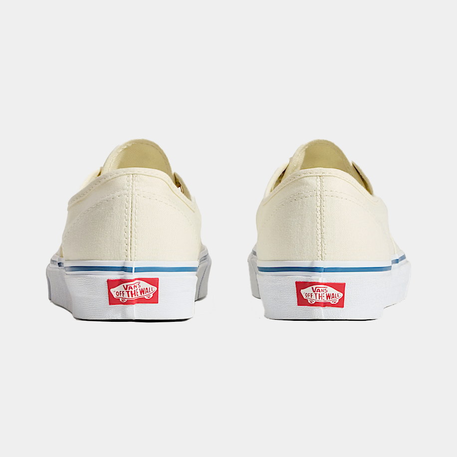 Cream low-top sneakers, back view with Vans logo and blue heel stripe