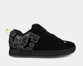 Black low-top sneakers with gray DC-style print and neon green pull tab