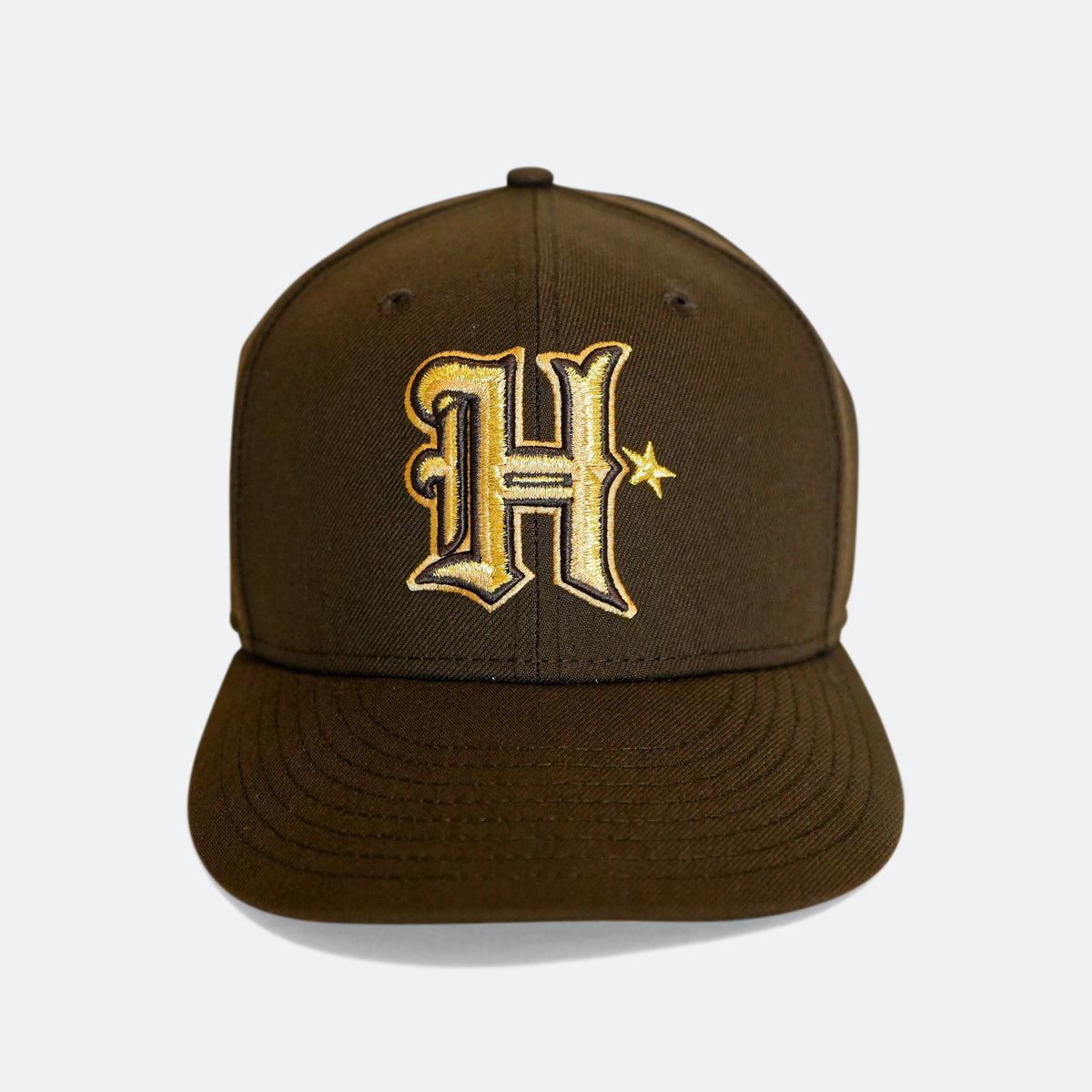 Brown 59Fifty cap with gold 'H' logo and star embroidery