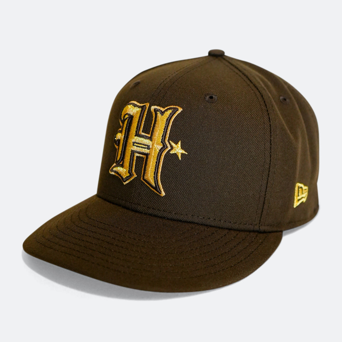 Brown 59Fifty cap with gold-outlined 'H' logo and star details