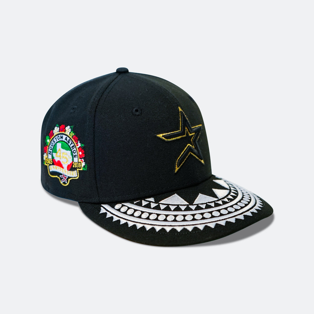 Black baseball cap with multicolor side crest, gold star, and patterned white brim