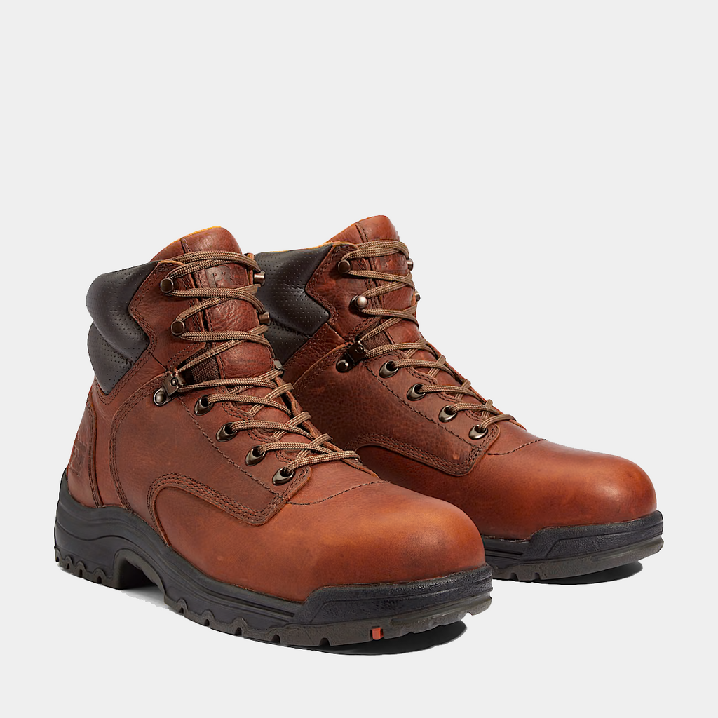Brown lace-up safety toe work boots pair with padded collars and durable tread