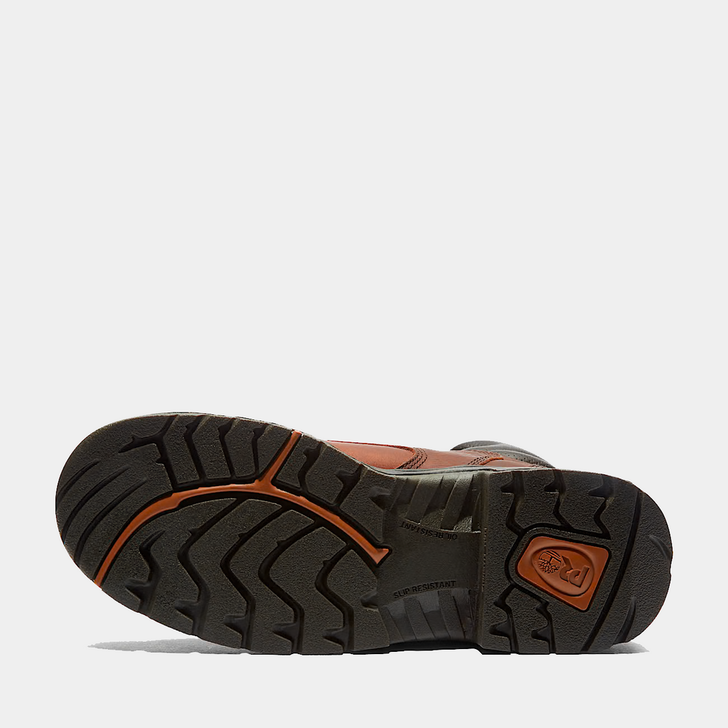 Brown safety work boot outsole with black tread and orange trim
