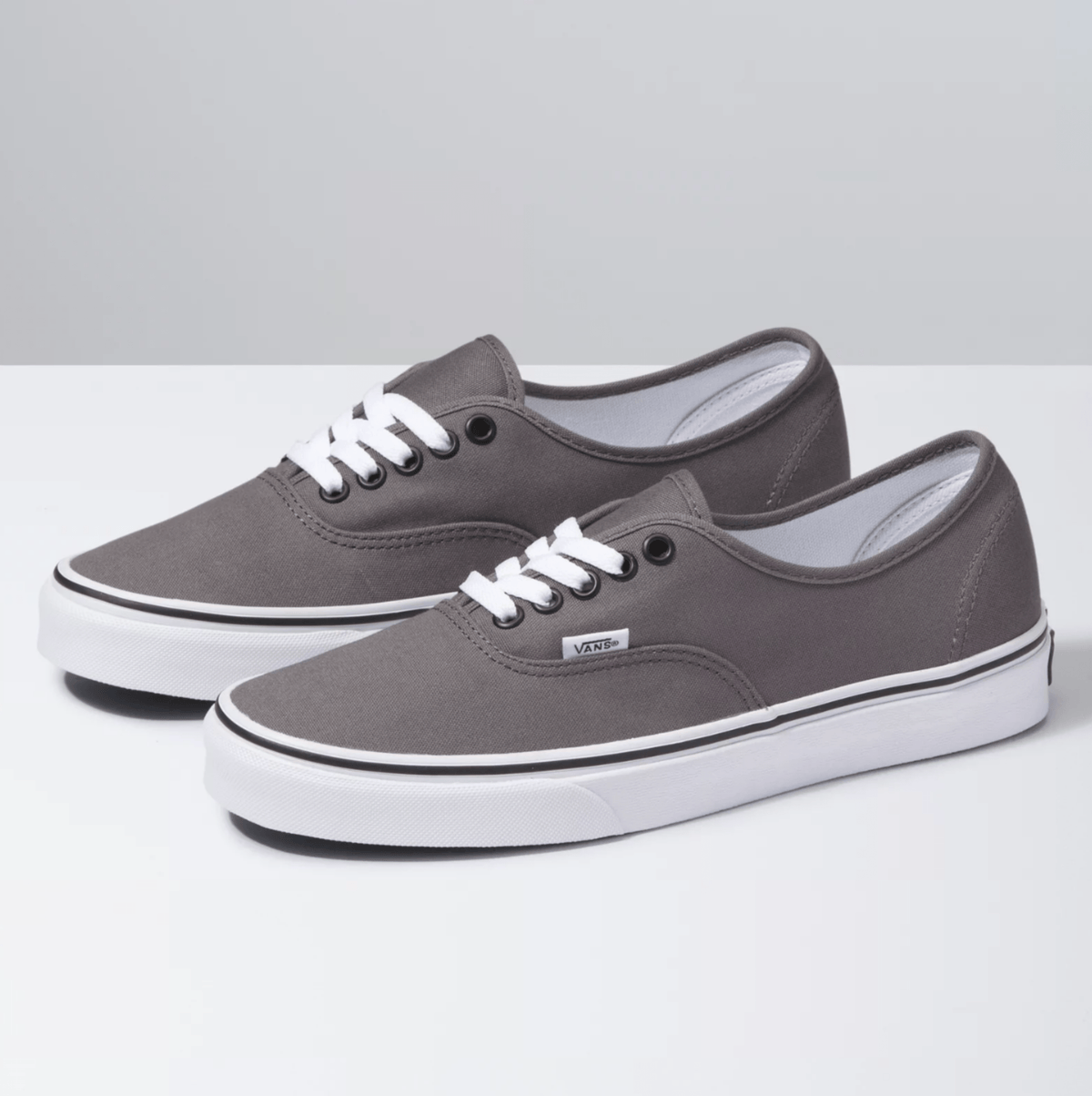 Grey canvas low-top sneakers, lace-up front, white rubber sole