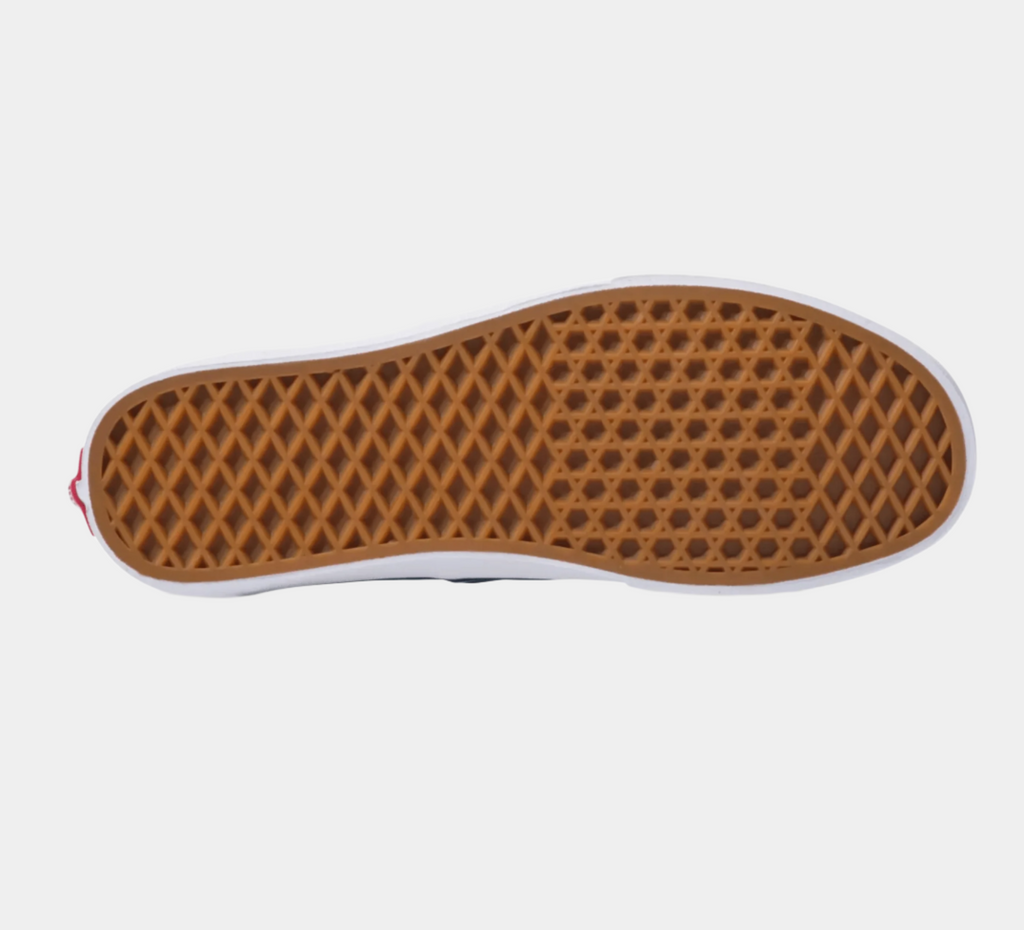 Red sneaker outsole with brown waffle tread and white rubber edge