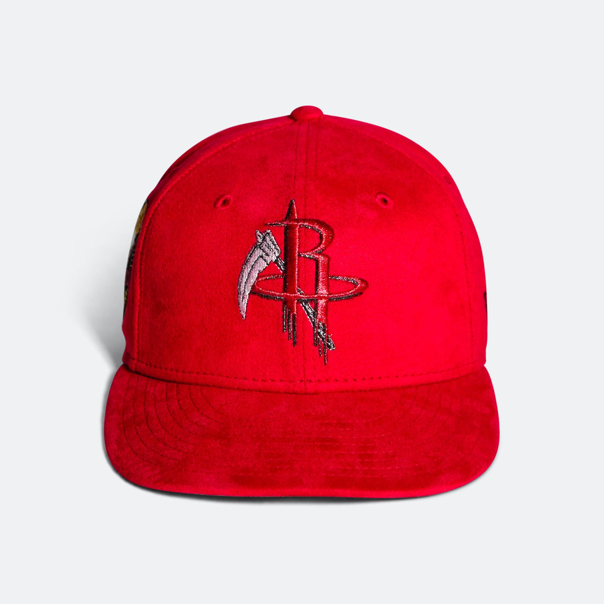 Red baseball cap with embroidered Rockets-style B logo on front