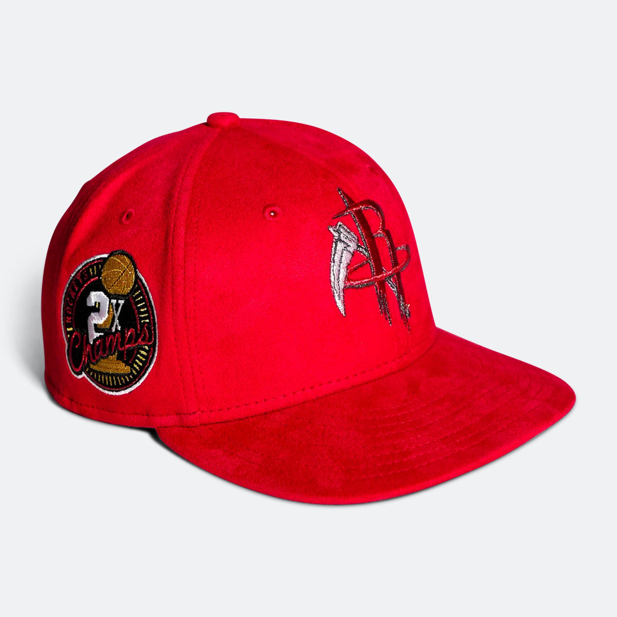 Red baseball cap with Rockets-style B logo and circular side patch