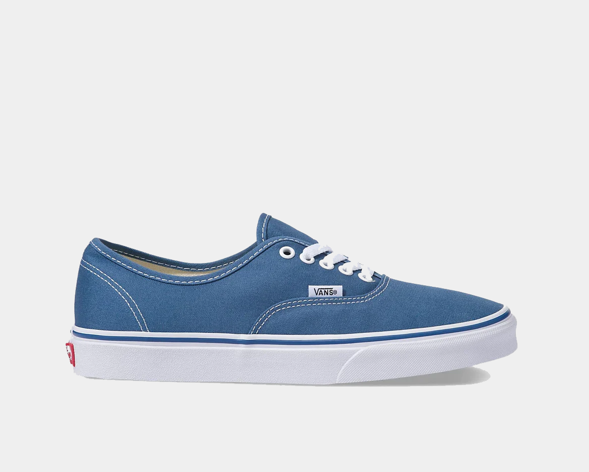 Navy canvas low-top sneakers with white laces and blue side stripe