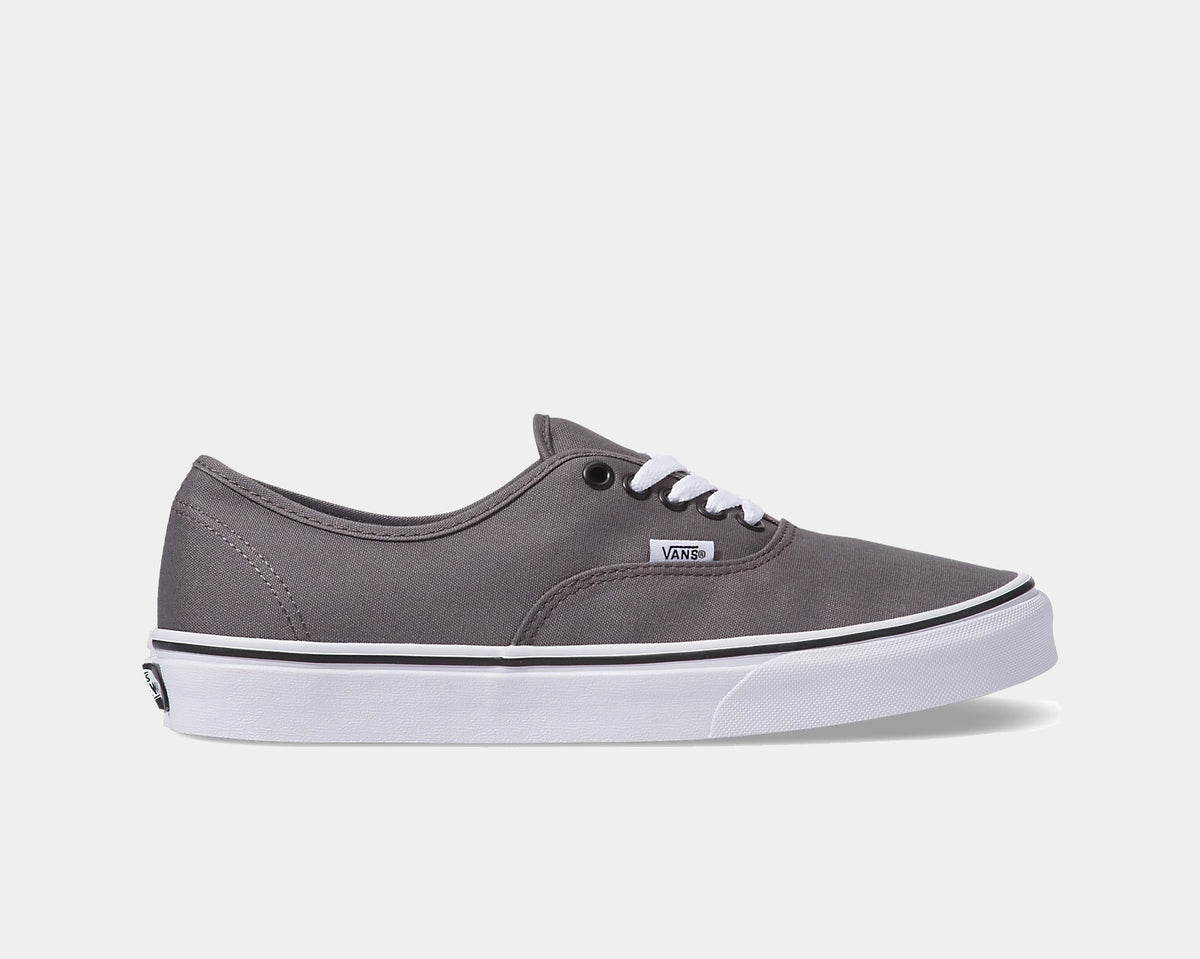 Grey canvas low-top sneakers with white laces and vulcanized rubber sole