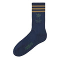 Crew socks in collegiate navy with tan-and-gold striped cuff and green graphic logo