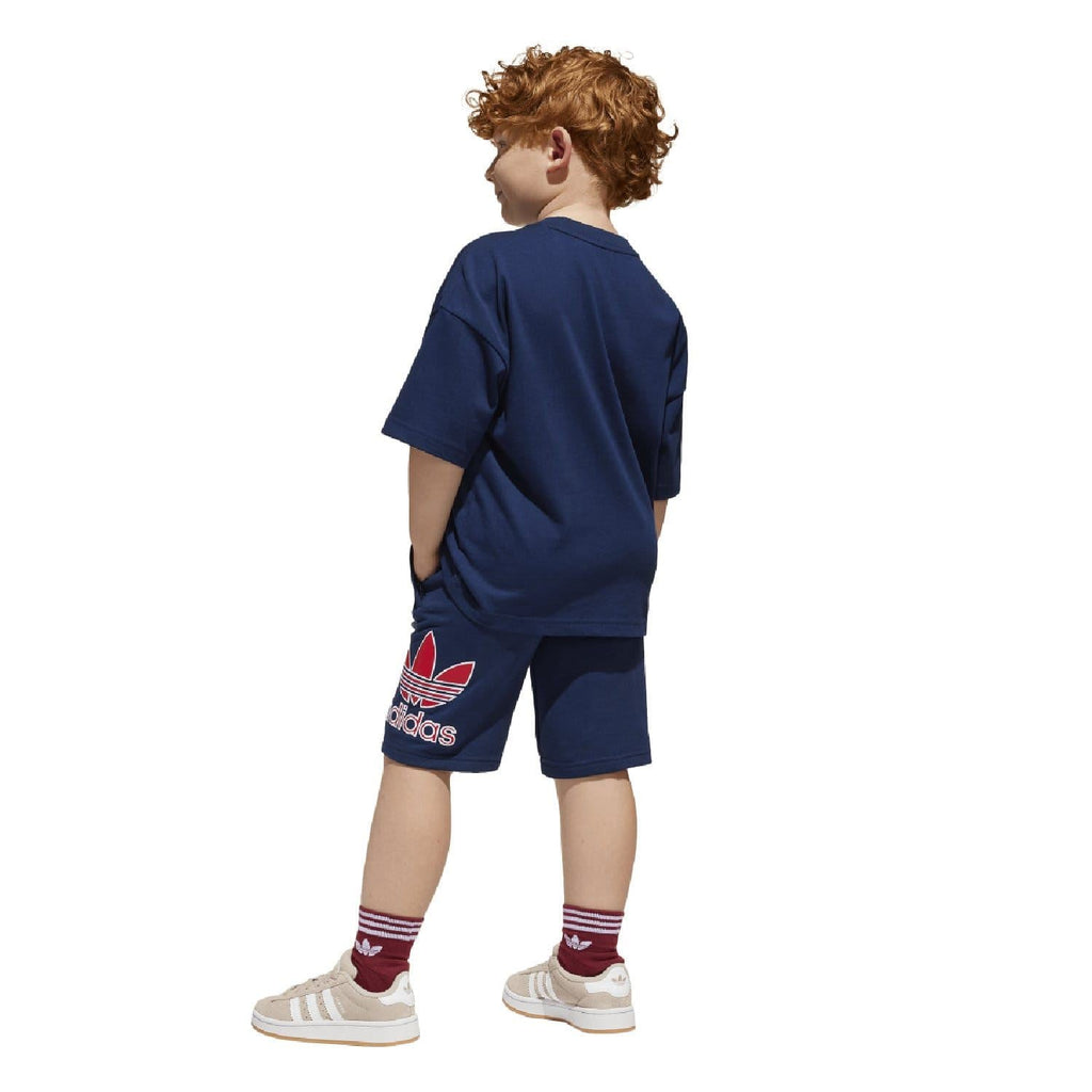 Kids adidas T-shirt and shorts set shown from back in navy with trefoil logo