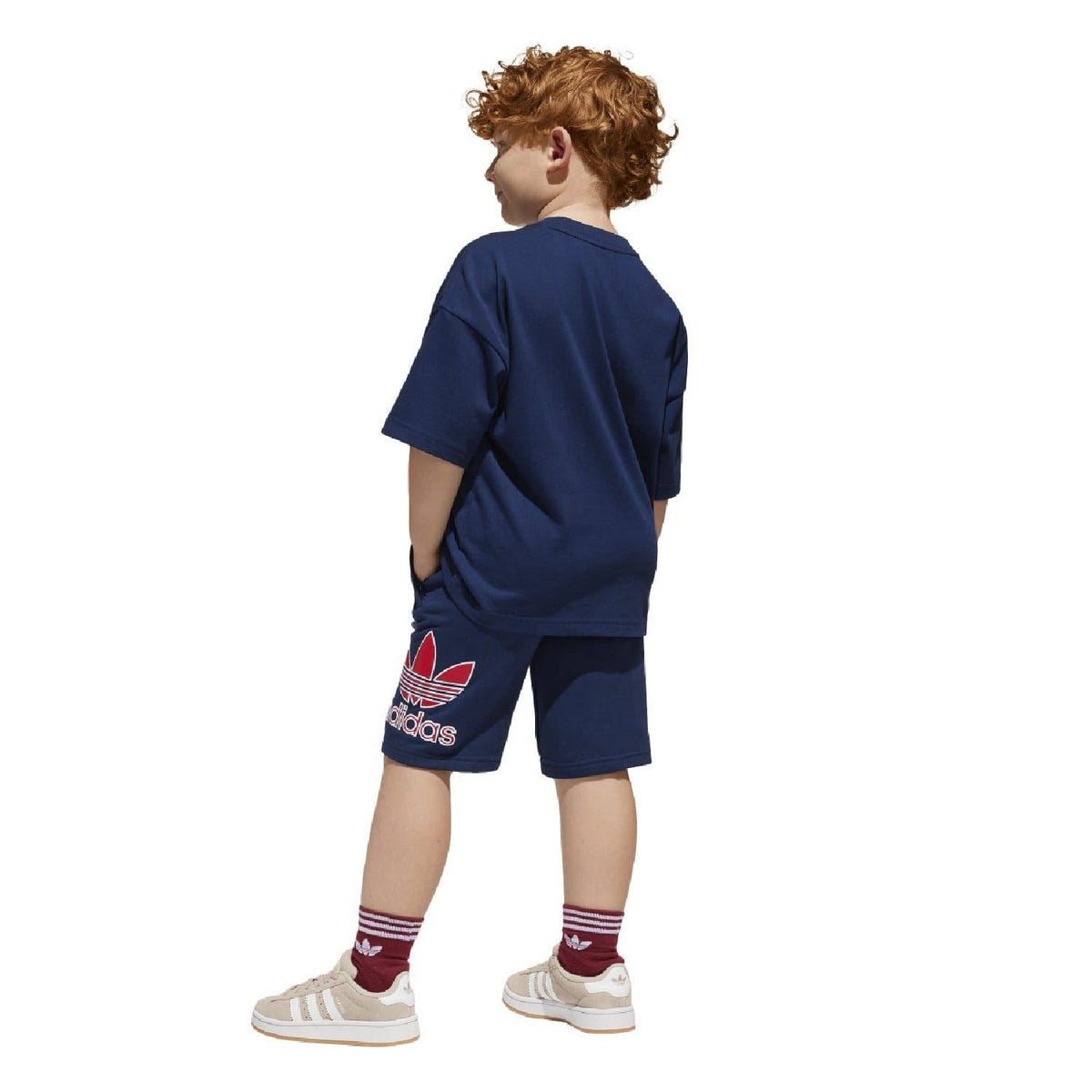 Kids adidas T-shirt and shorts set shown from back in navy with trefoil logo