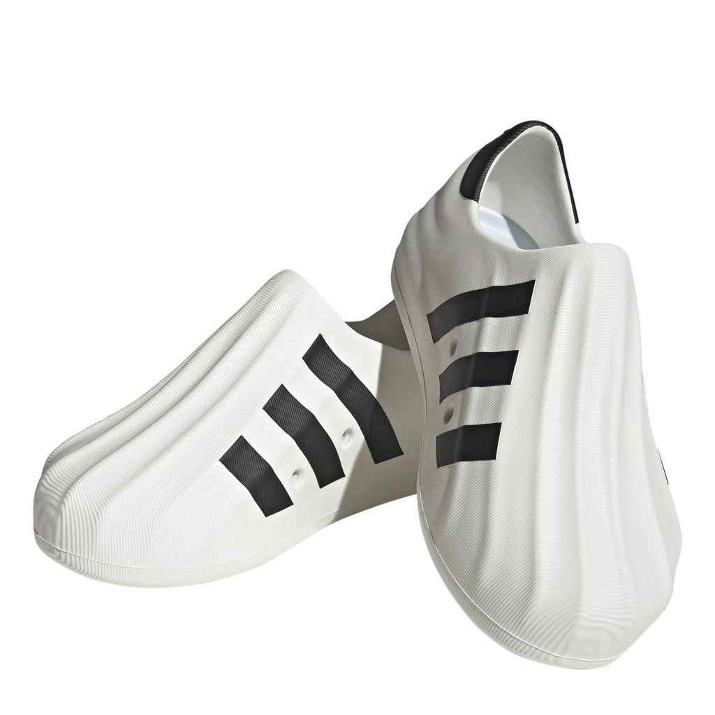 adidas Originals Superstar Slip On Trainers, stylish casual footwear with classic design, white color, and slip-on style.