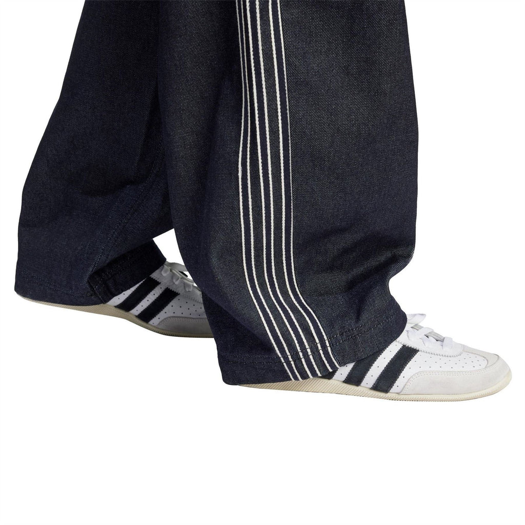 Indigo wide-leg jeans with triple stripe down the outer leg and ribbed cuff hem
