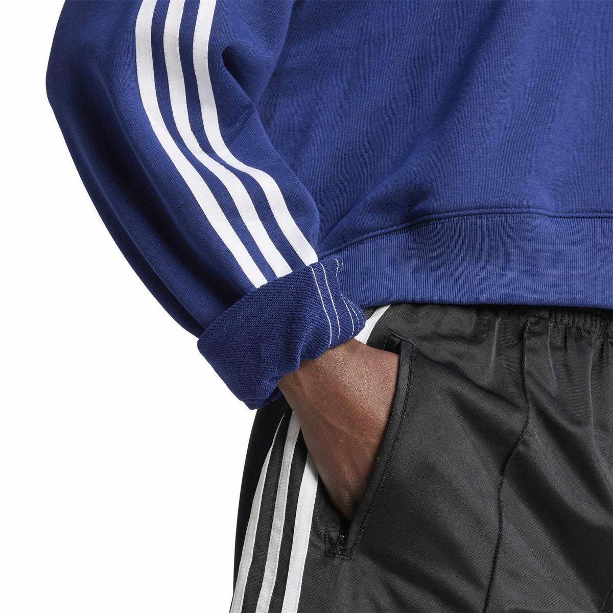 adidas Originals 3 Stripes crew neck long sleeve sweatshirt with classic design and white stripes on the sleeves.