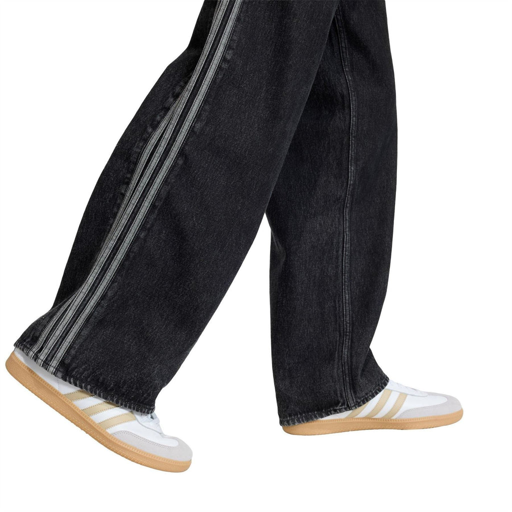 Black wide-leg denim jeans with side stripe panels and wide cuff hem