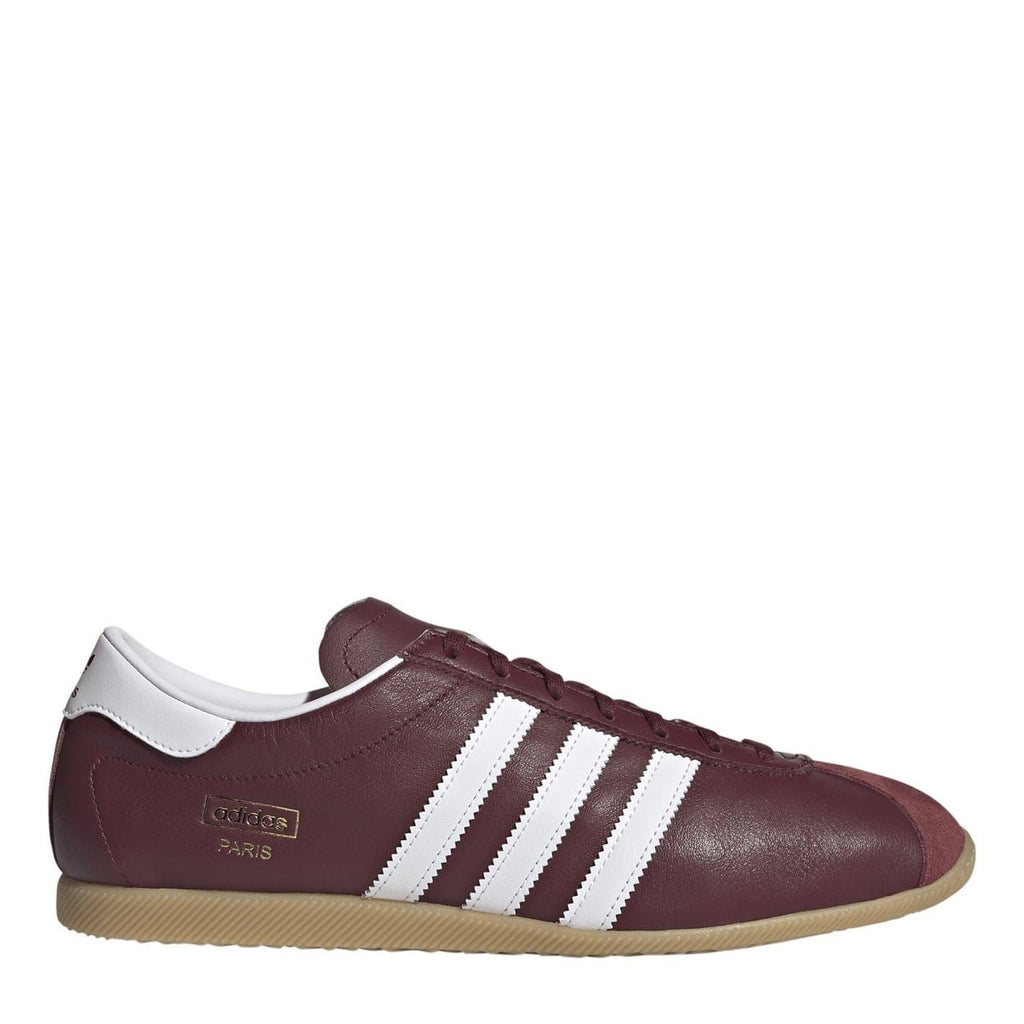 Burgundy lace-up low top sneakers with white three-stripe detail and gum sole