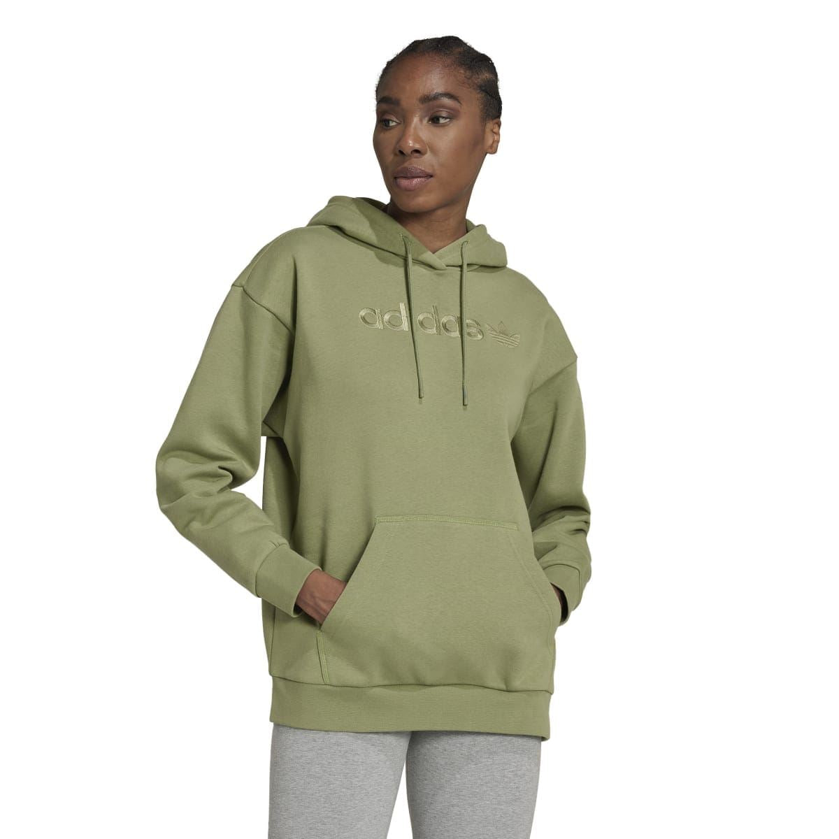 Green adidas Originals boyfriend hoody on model, hood with drawstrings and front logo