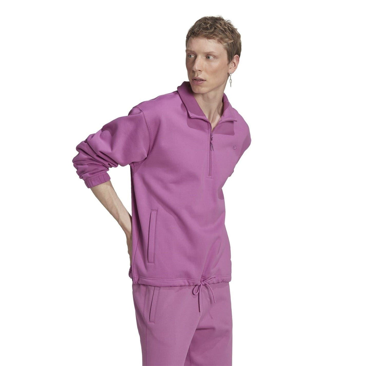 Purple half-zip crew sweatshirt with stand collar and front zip closure.