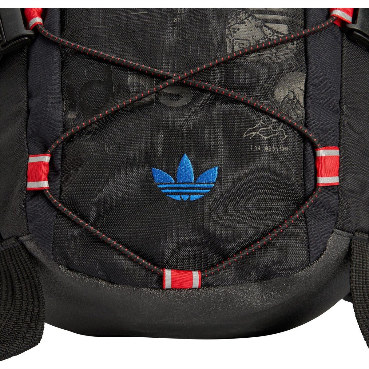 Front panel of dark carbon backpack with blue trefoil logo and red striped trim