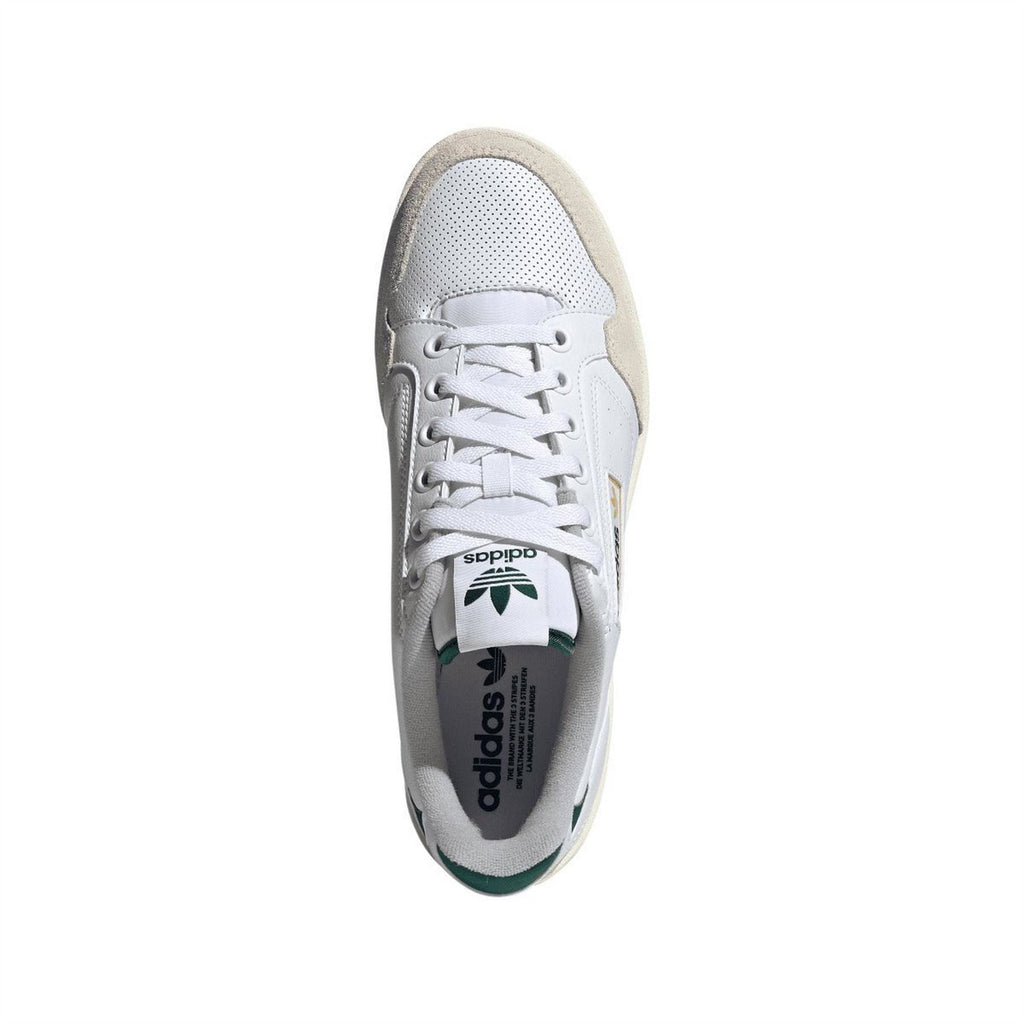 White adidas Originals low-top trainer close-up of laces and perforated toe panel