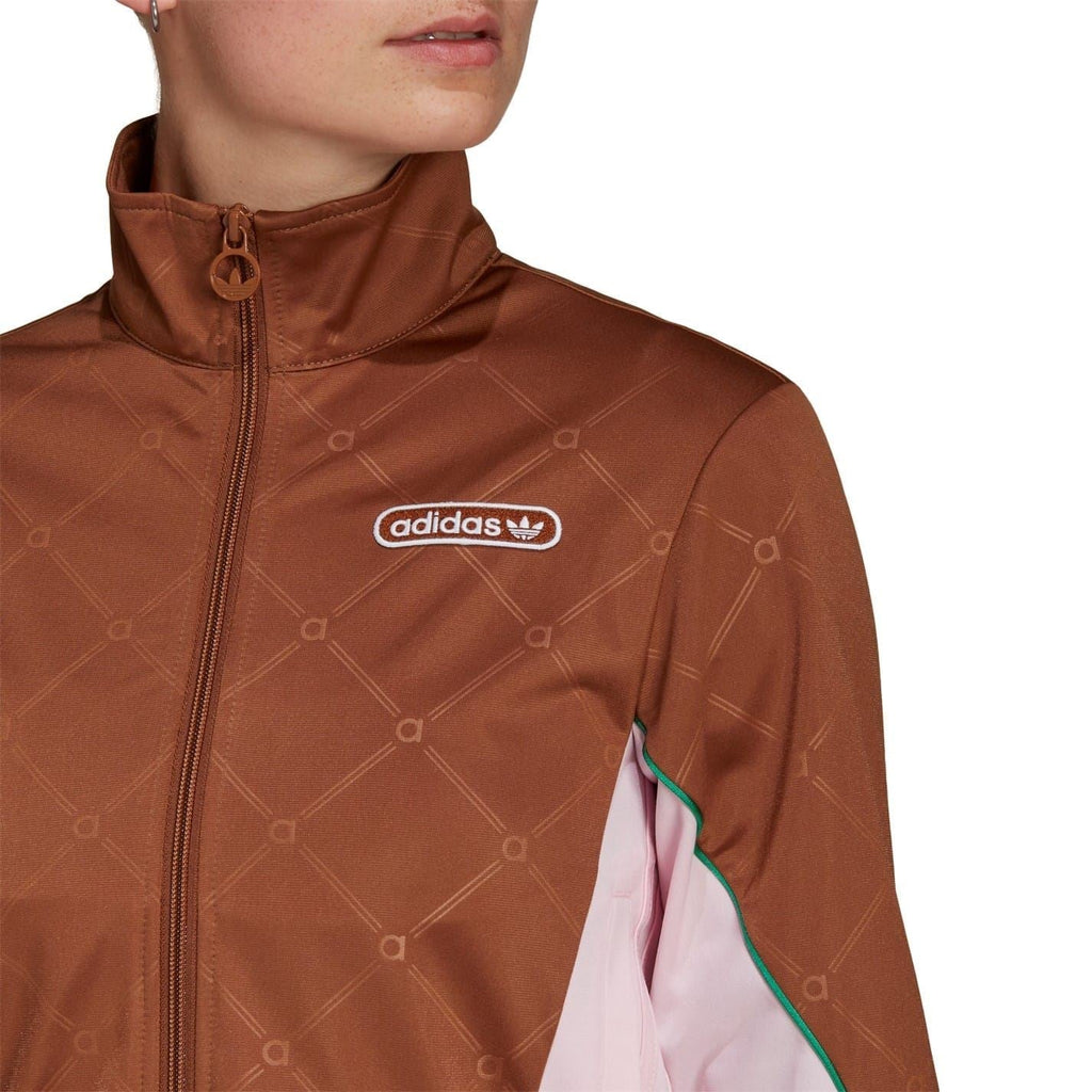 Brown mock neck track jacket with adidas chest logo and subtle diamond pattern