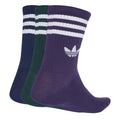 Three pairs of adidas Originals long crew socks with iconic three stripes in black, white, and gray, displayed flat.