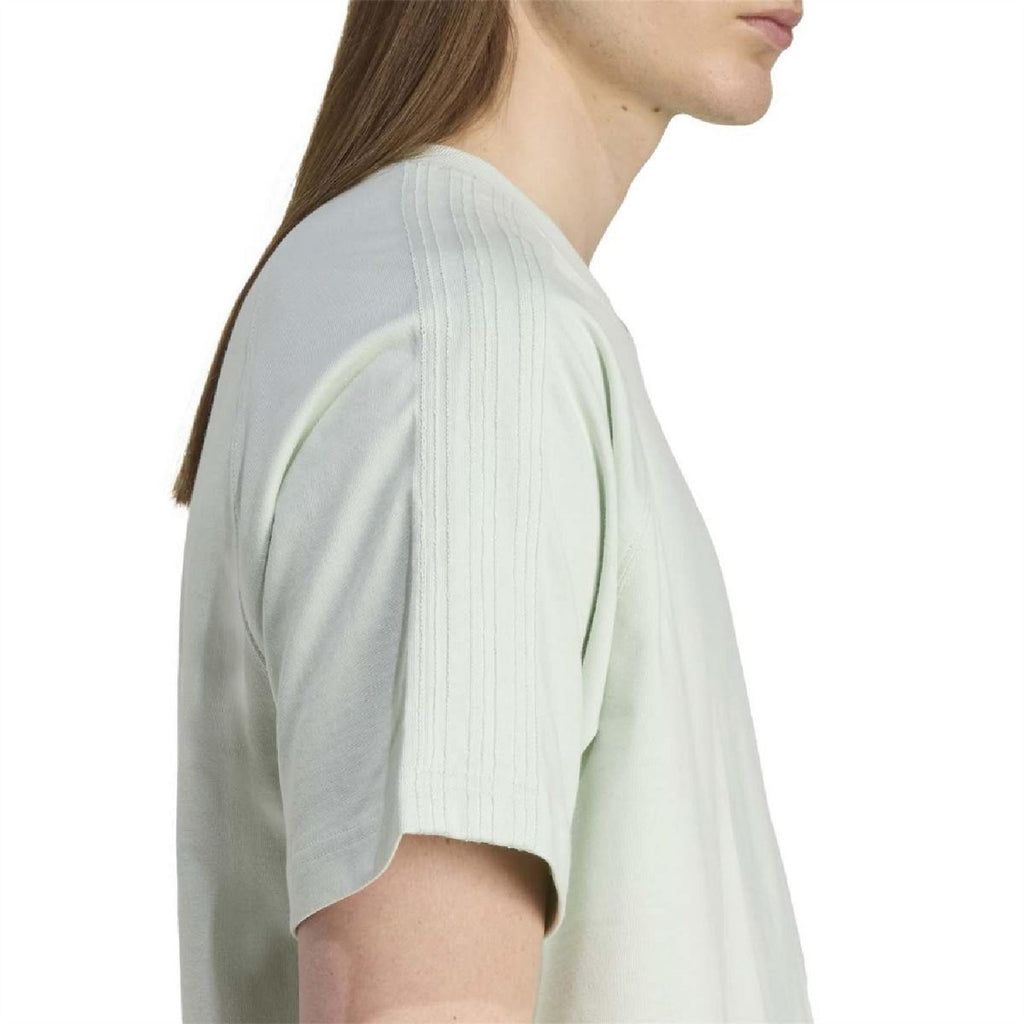 adidas Originals raglan sleeve T-shirt in light green, side view of shoulder seam