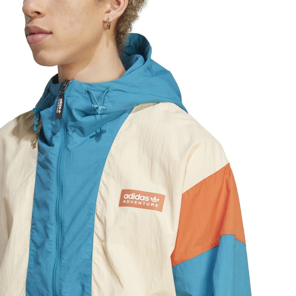 adidas Originals hooded windbreaker jacket close-up of front zip and chest patch