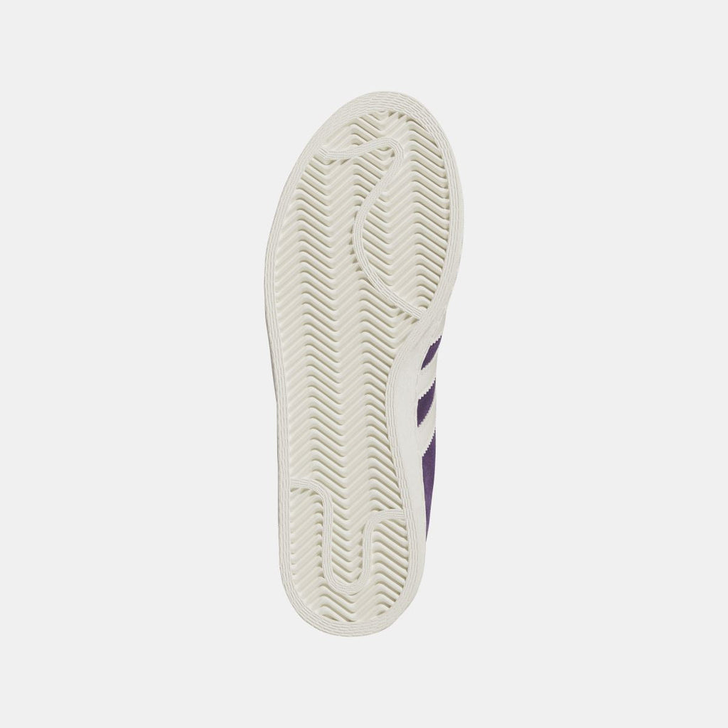 White outsole tread of purple adidas Originals Jabbar Lo sneaker with side stripe pattern