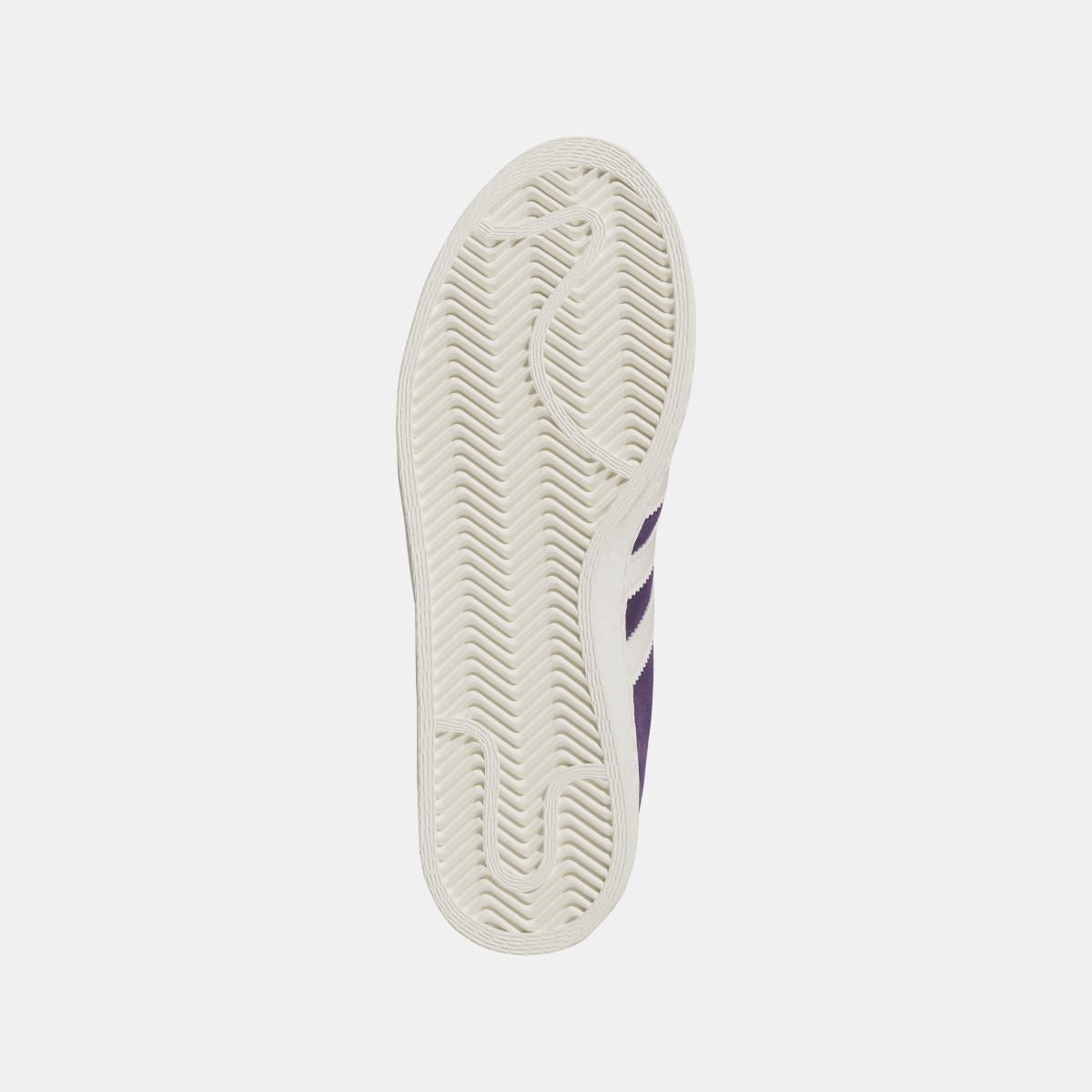 White outsole tread of purple adidas Originals Jabbar Lo sneaker with side stripe pattern