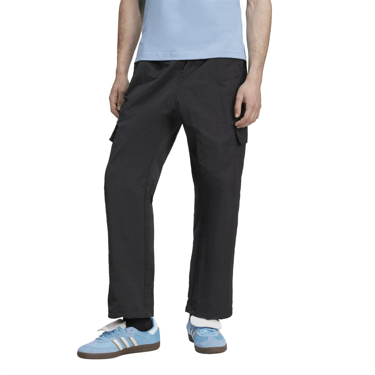 Adidas Originals black cargo pants with cargo flap pockets and relaxed fit