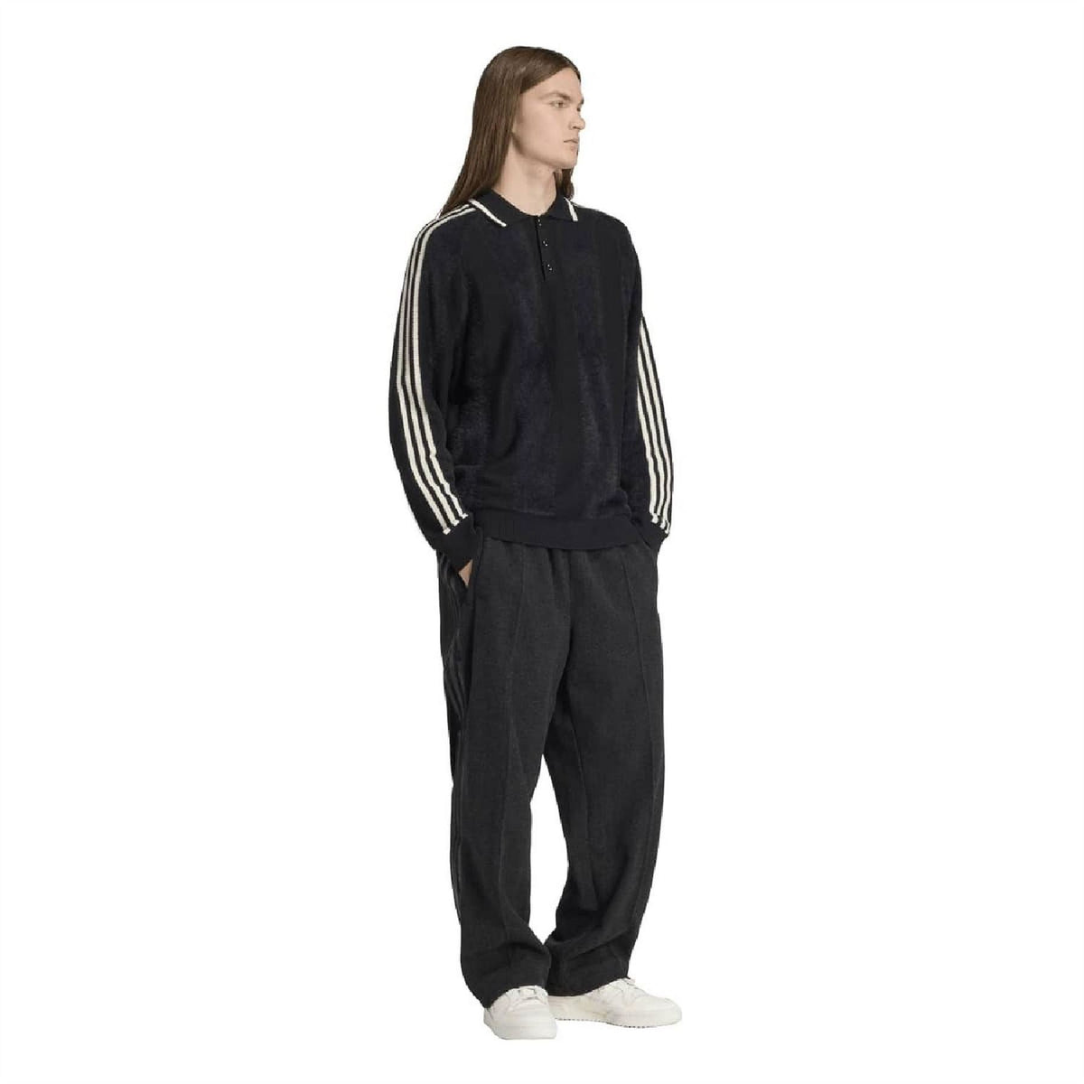 Black collared raglan sweater with white triple stripe bands on sleeves and ribbed cuffs