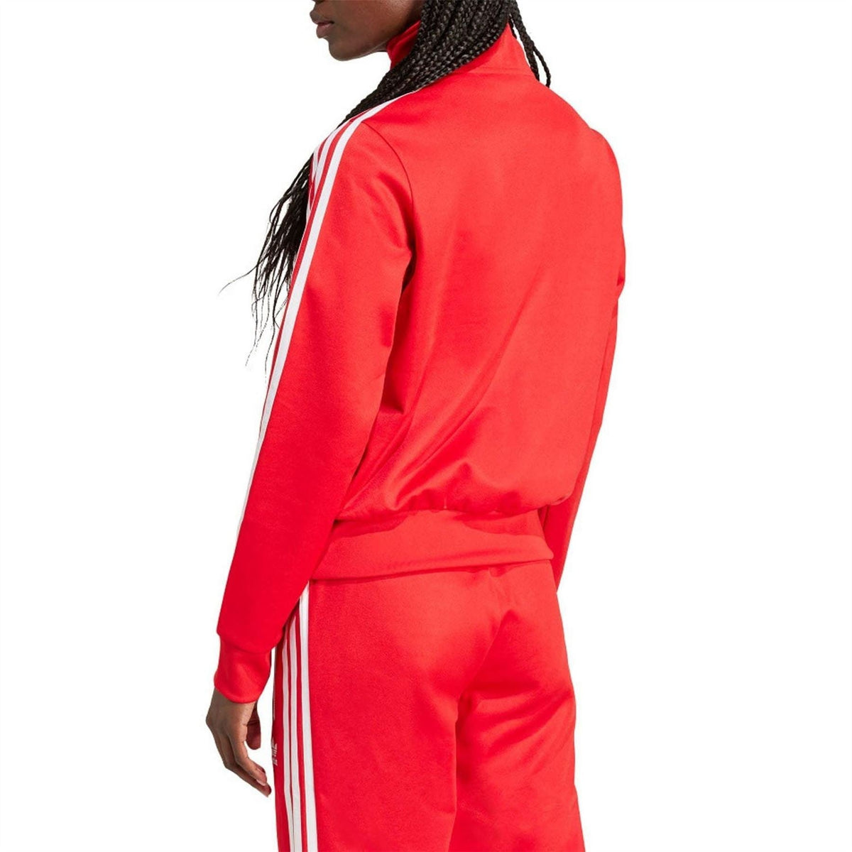 Red track jacket with stand collar, quarter-zip front and white triple sleeve stripes