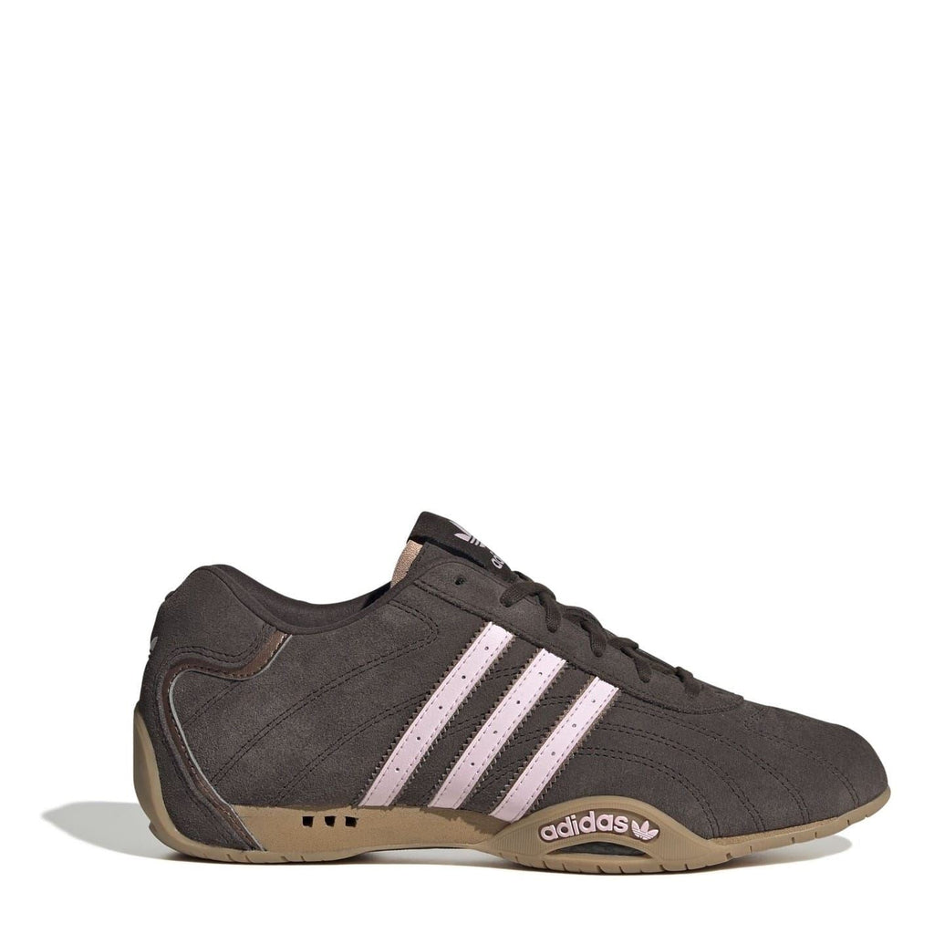 Dark brown low-top sneakers with three white/pink stripes and gum rubber sole