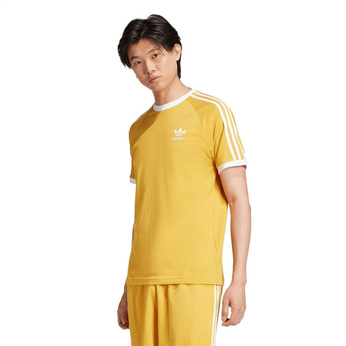 Yellow adidas Originals 3-Stripes T-shirt with white crew neck and sleeve stripes