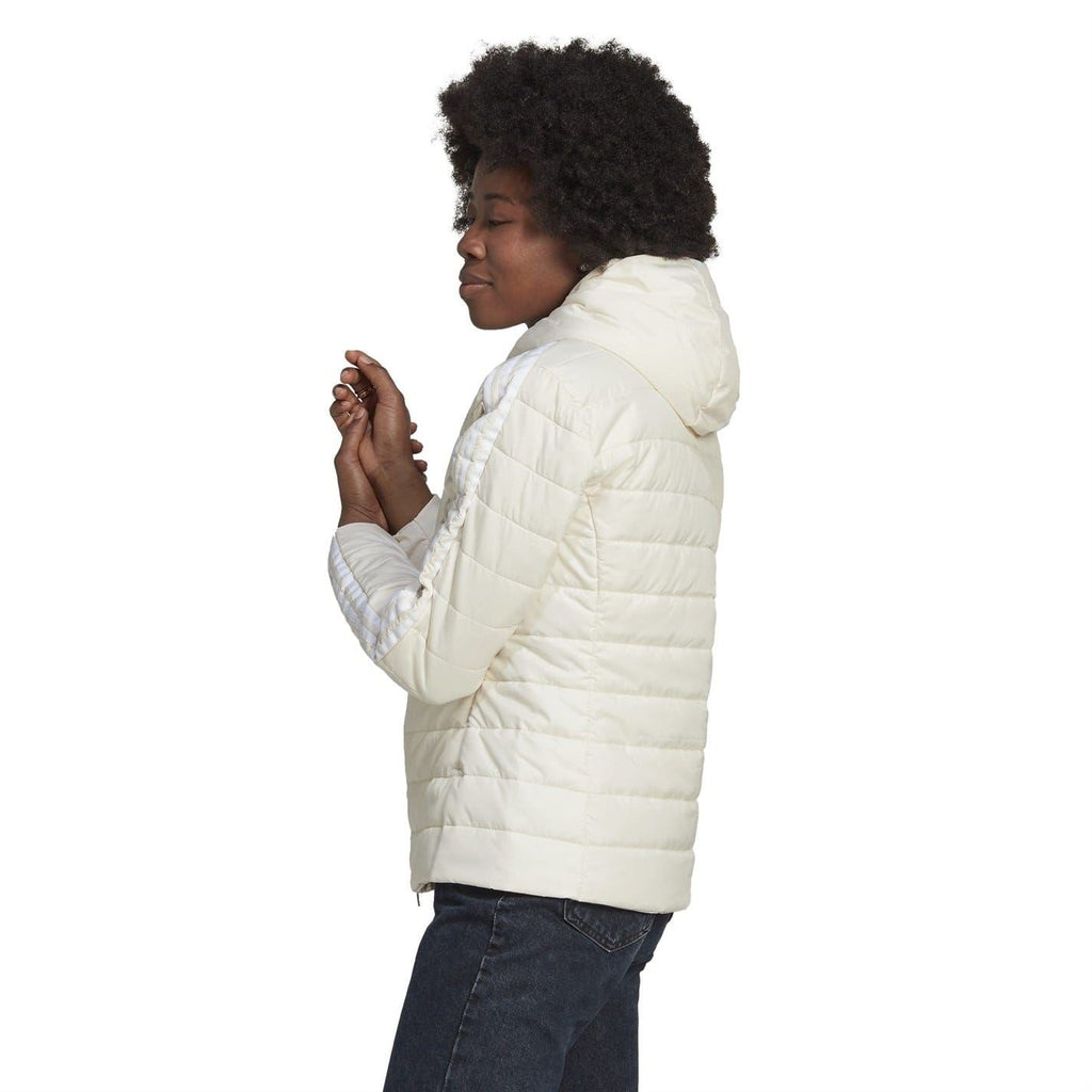 Light cream hooded puffer jacket, angled back/side view, quilted insulation.