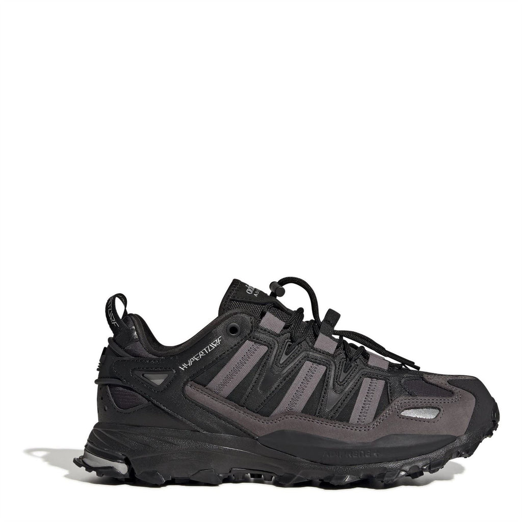 Black adidas hiking-style sneaker with chunky tread and lace-up closure.